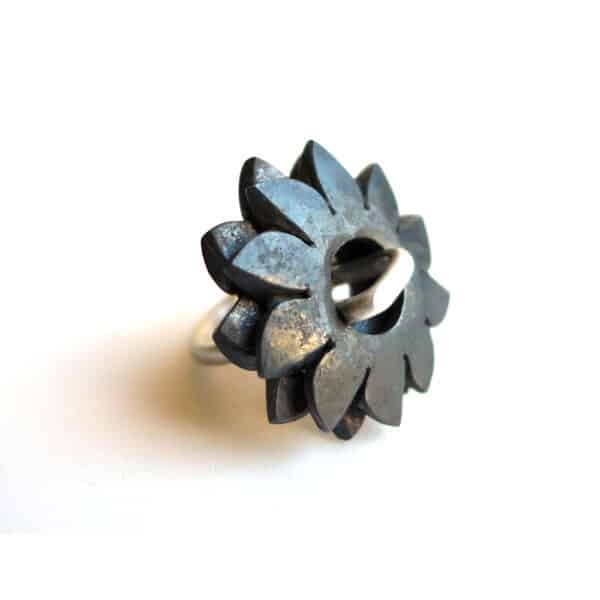 Steel forged jewelry by Marianne Anselin