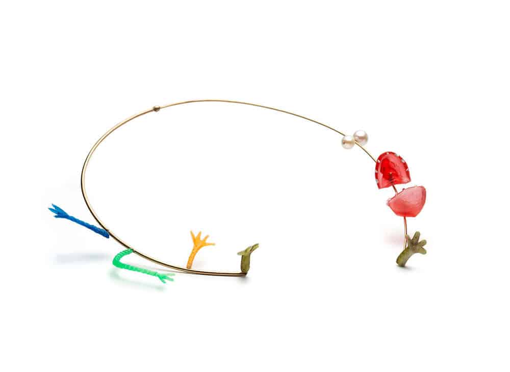 Playful jewelry in gold and found materials by Silvie Altschuler